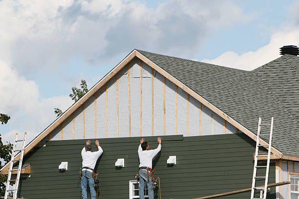 Professional Vinyl Siding technician working in East Hampton, CT